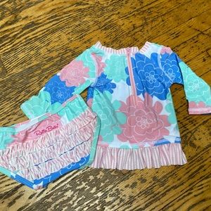 Sweetest little swim suit that will keep shoulders from burning!  Ruffle Butts